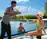 A couple are pleased with the best gourmet drink selection available by the pool in Kanifushi island resort